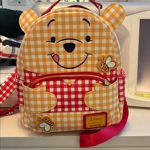 Loungefly Winnie the Pooh mini backpack New without tags. Never used